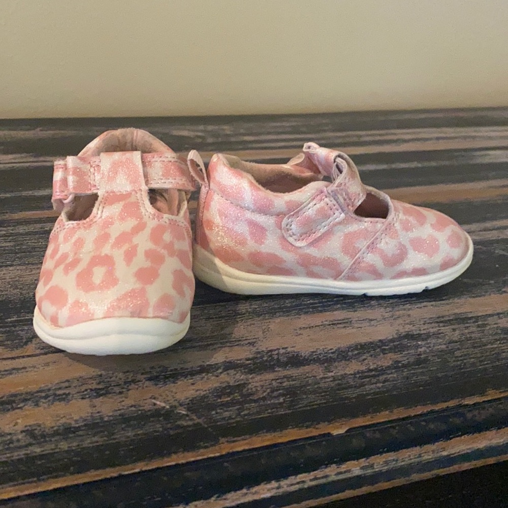 Pink cheetah print walking shoes